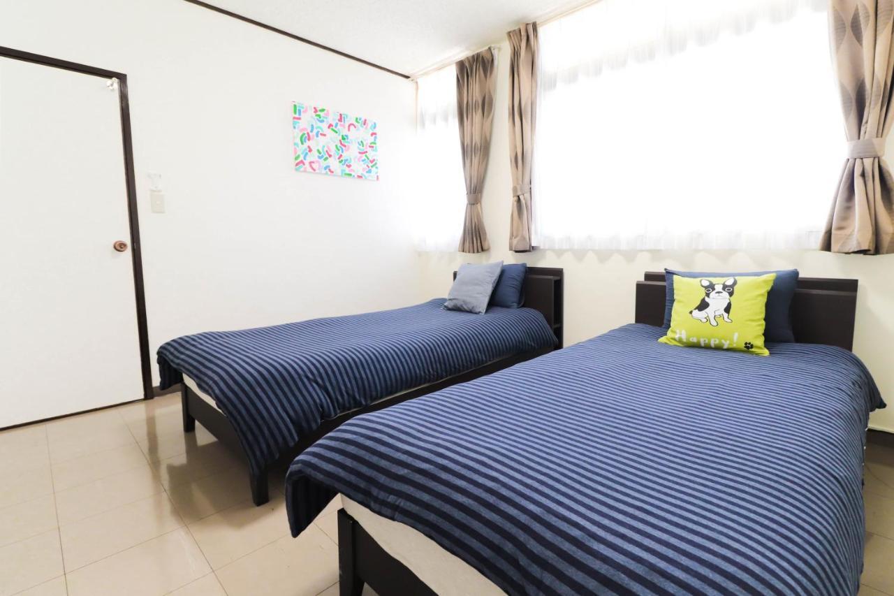 Condominium Hotel Mihama Upi Chatan Buitenkant foto
