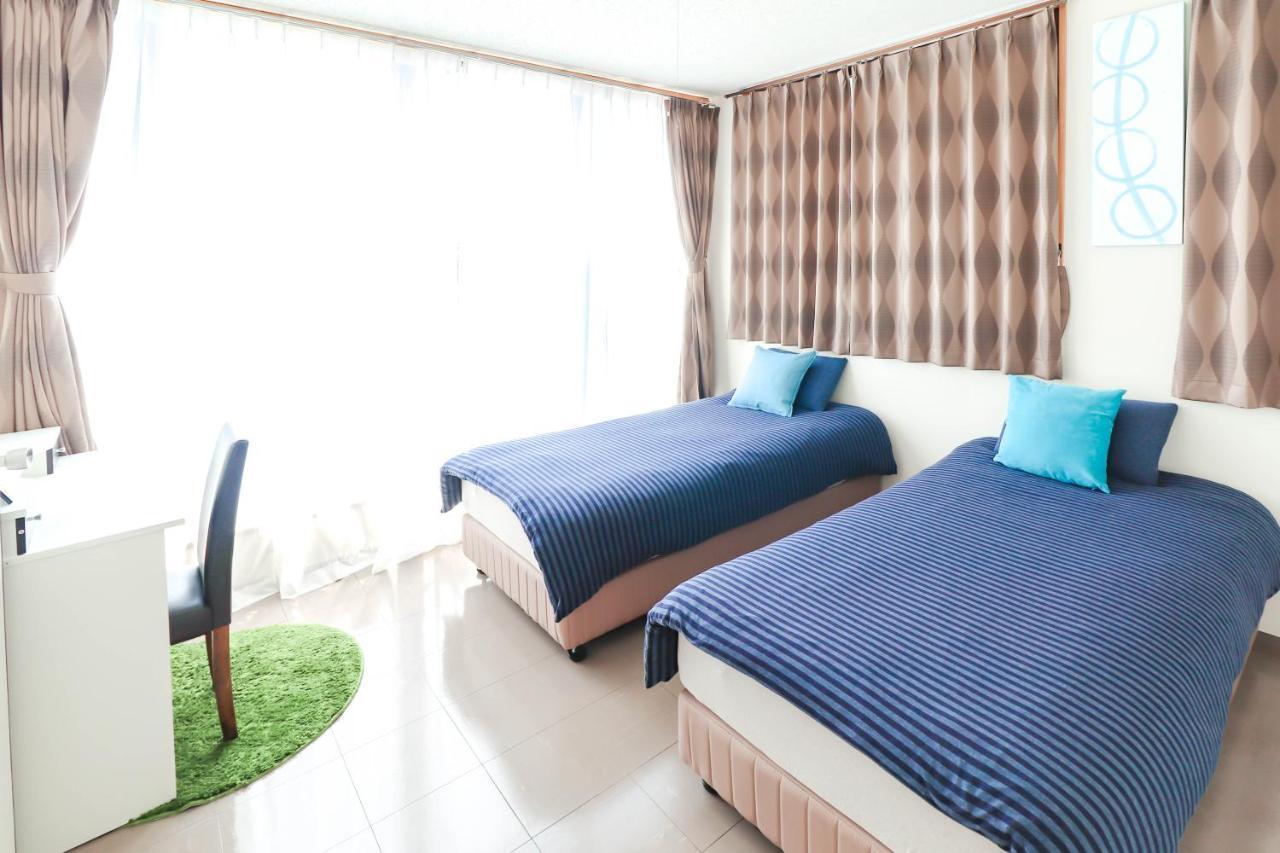 Condominium Hotel Mihama Upi Chatan Buitenkant foto