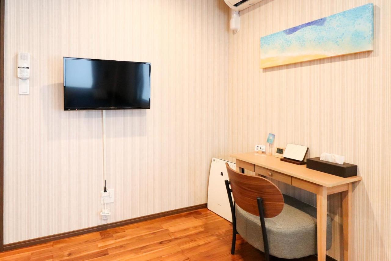 Condominium Hotel Mihama Upi Chatan Buitenkant foto