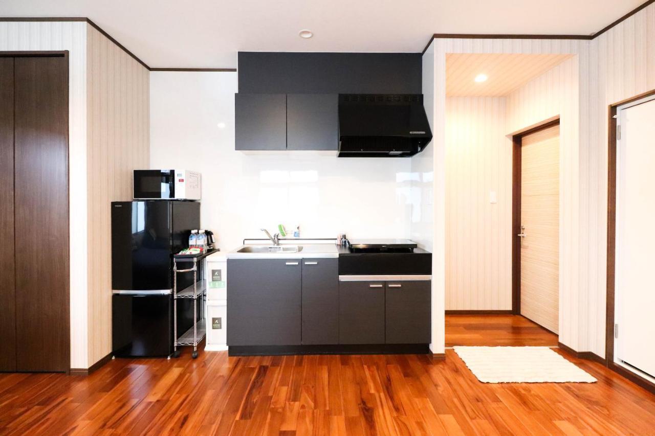 Condominium Hotel Mihama Upi Chatan Buitenkant foto